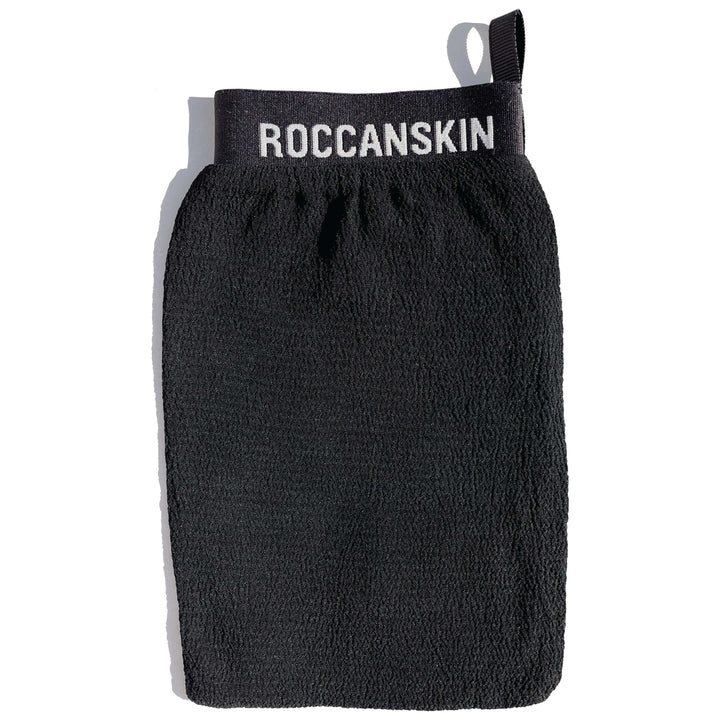 ROCCANSKIN™ offers spa-level exfoliation that lifts off dead skin cells to unveil your skin's natural glow and softness. Our best-seller combats dryness, keratosis pilaris, impurities, uneven skin tone, and promotes collagen production, and skincare absorption. With a gentle, non-stripping texture and a luxurious elastic band unlike others, ROCCANSKIN™ is the gift of great skin and self-care.