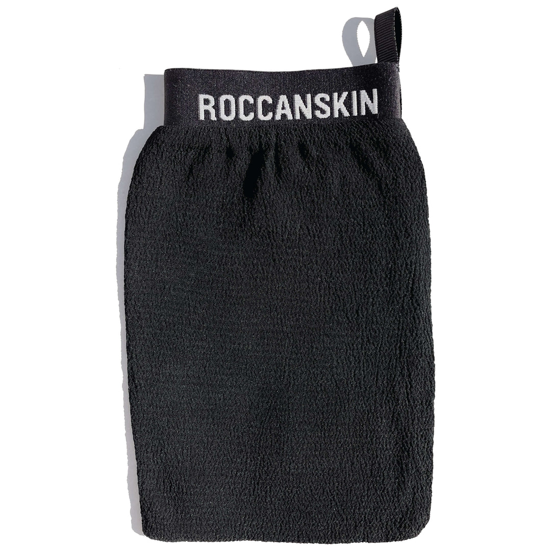 ROCCANSKIN™ offers spa-level exfoliation that lifts off dead skin cells to unveil your skin's natural glow and softness. Our best-seller combats dryness, keratosis pilaris, impurities, uneven skin tone, and promotes collagen production, and skincare absorption. With a gentle, non-stripping texture and a luxurious elastic band unlike others, ROCCANSKIN™ is the gift of great skin and self-care.